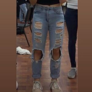 Light blue distressed jeans.